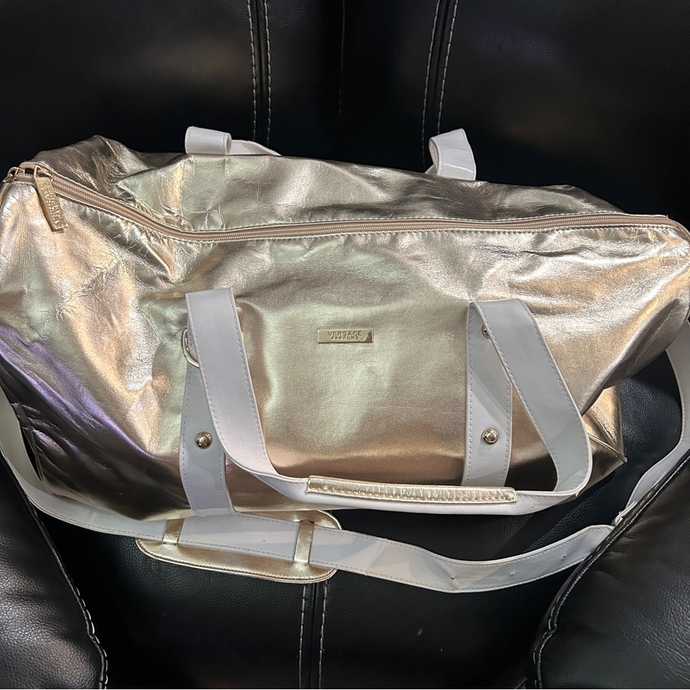 Versace perfume gold duffle bag tote
